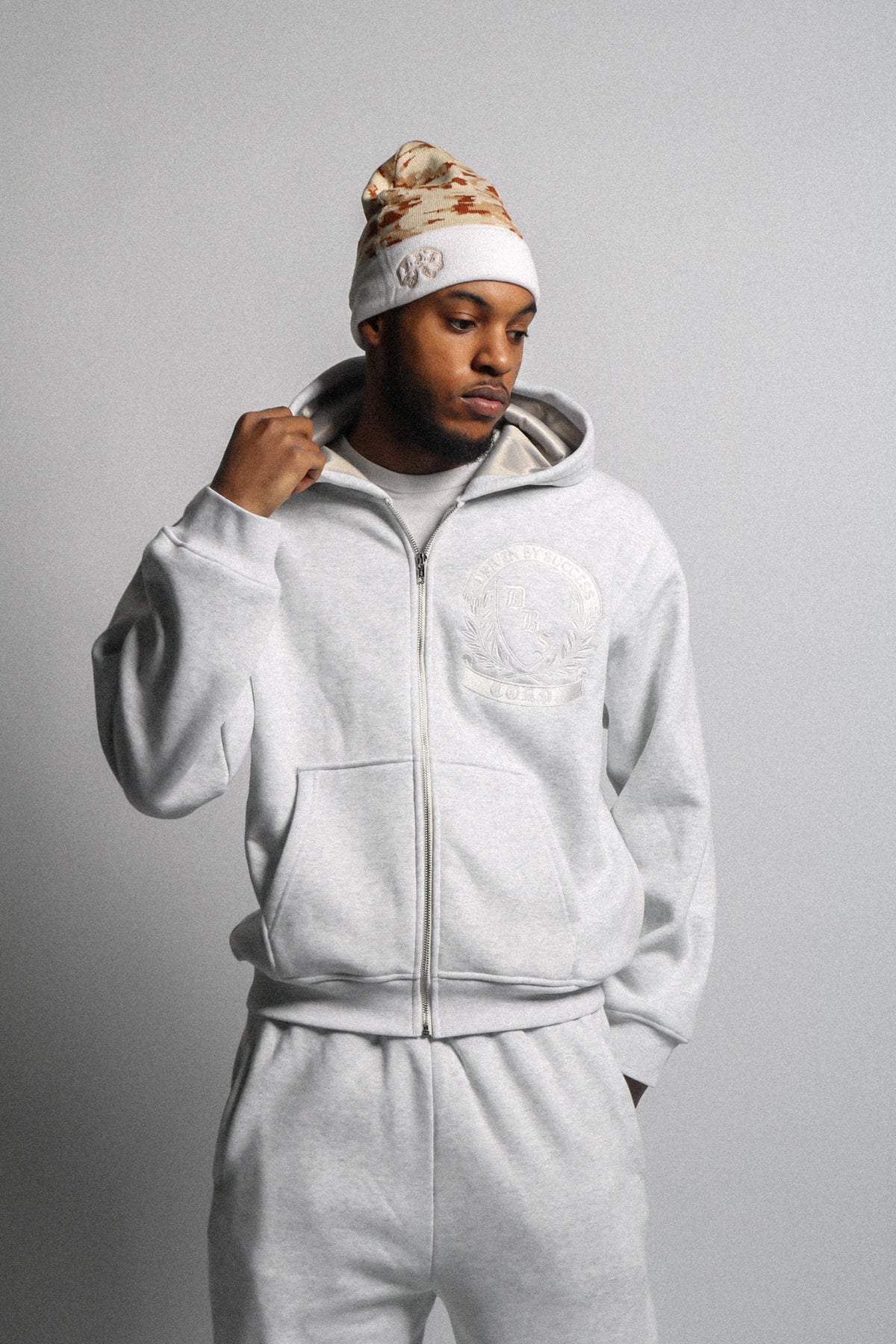 Experience heavyweight 400 GSM fabrics and sherpa-lined comfort with a satin lined hood designed by insiders who care about your investment.